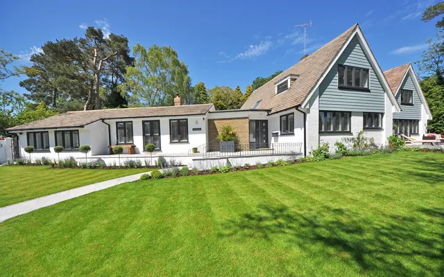 White house exterior with clean siding and walls